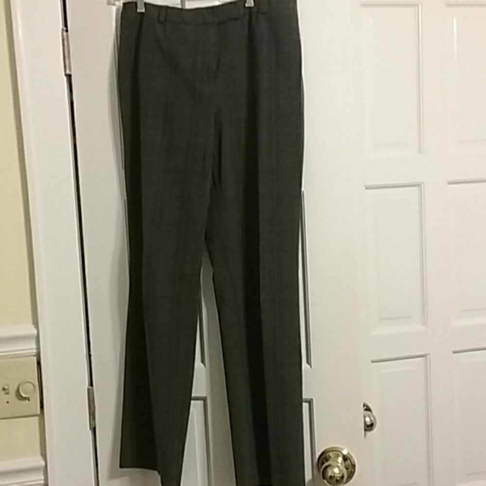 Gray pants with black and white pinstripes